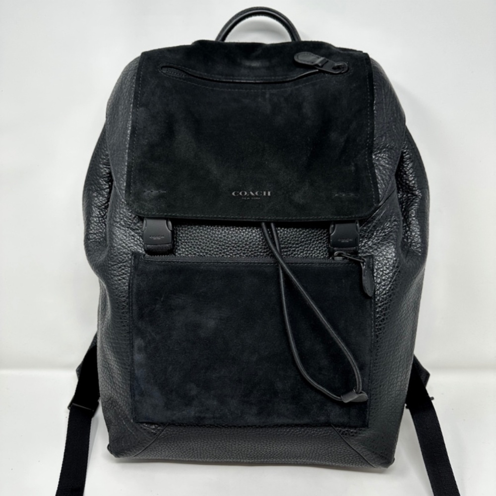 Coach Manhattan Backpack crafted in black leather with suede paneling